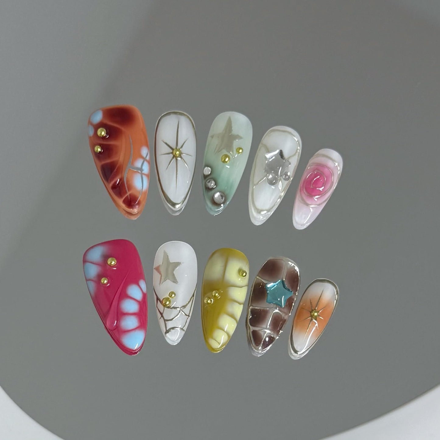 10Pcs Medium Almond Handmade Press On Nails | Easy Apply & Remove, Reusable Salon Quality Nails | Y2K Punk Multicolor Fake Nails with 3D Floral, Star & Gold Bead Accents(5U01, S)