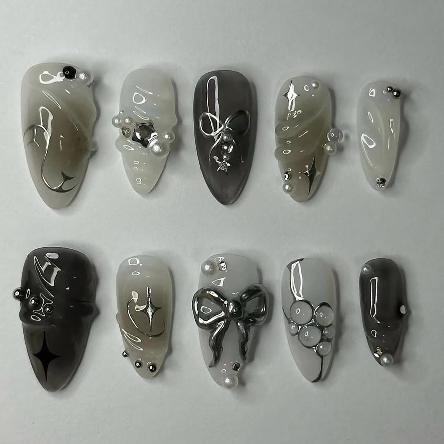 24Pcs Black Press on Nails Medium Almond Fake Nails 3D Silver Bow Pearl Star Glitter Design Full Cover Stick on Nails Artificial Nails Gothic False Nails Y2k Glue on Nails for Women Acrylic Nails