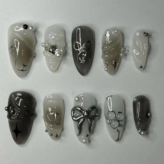 24Pcs Black Press on Nails Medium Almond Fake Nails 3D Silver Bow Pearl Star Glitter Design Full Cover Stick on Nails Artificial Nails Gothic False Nails Y2k Glue on Nails for Women Acrylic Nails