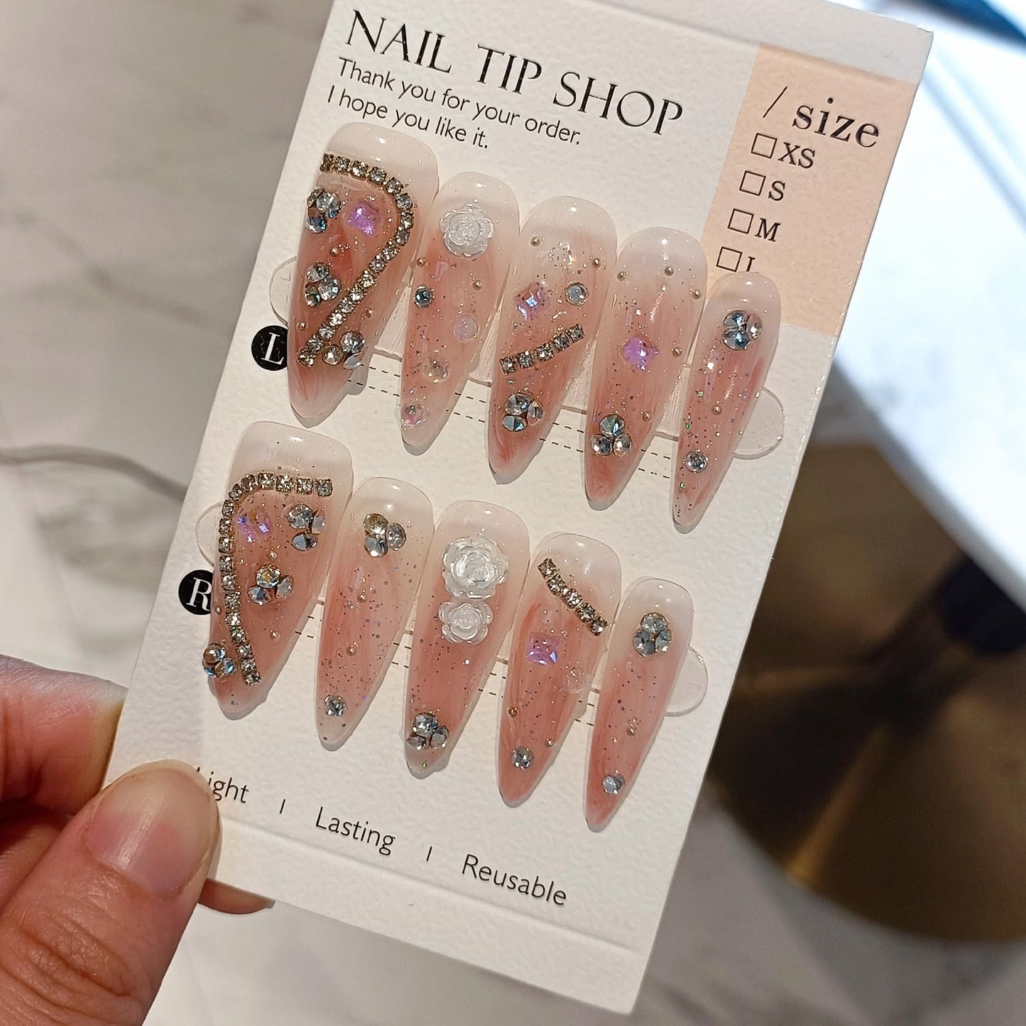 TENPAL Extra Long Stiletto Fake Nails with Coral Shimmer Base,3D Floral Chains Camellia Press on Nails Long Drop Shape,10pcs Versatile Soft Gel False Nails with Tools,Crystal Glitter Nails(XS,Orange)